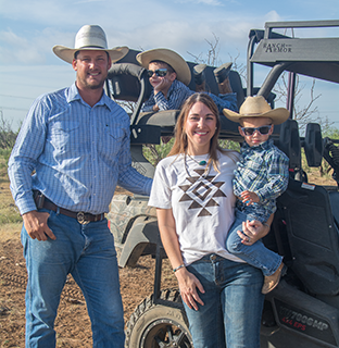 Carl and Emily Whitworth have implemented sustainable farming and ranching practices to keep their land healthy for future generations, including sons Levin, on the four-wheeler, and Waylon.