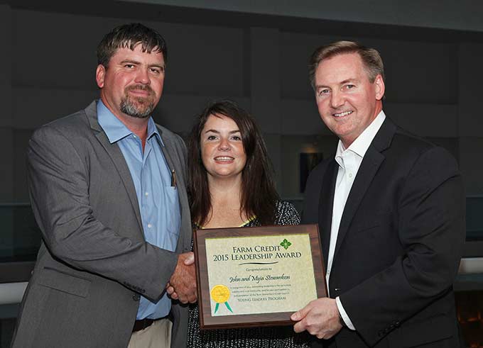 John and Myia Stewardson of San Saba, Texas, attended the 2015 Farm Credit Young Leaders Program on behalf of Central Texas Farm Credit. They celebrated their completion of the program in Washington, D.C., with Stan Ray, right, Farm Credit Bank of Texas Chief Administrative Officer and Tenth District Farm Credit Council President.